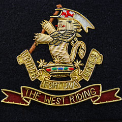 The west riding regiment blazer badge